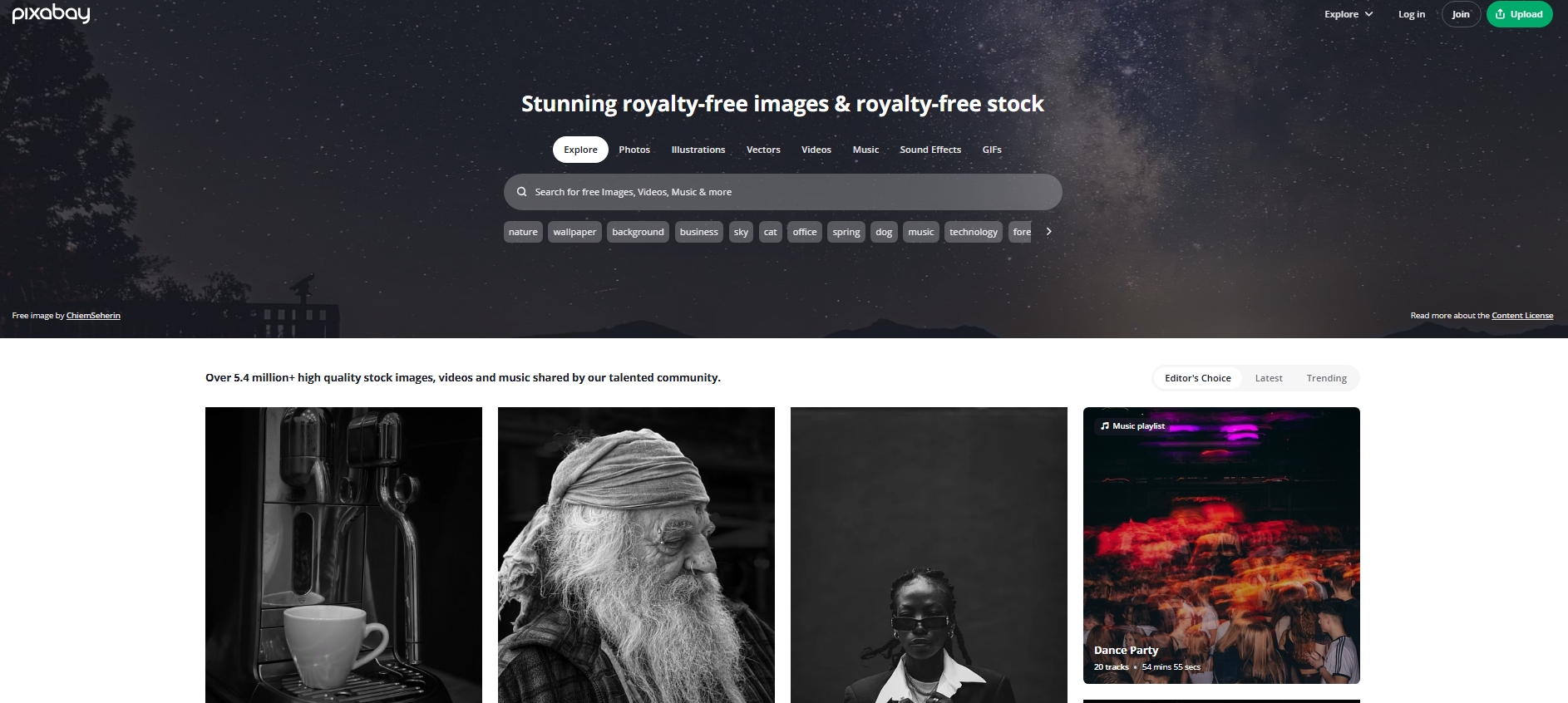 Pixabay homepage showcasing stock images, search bar, and featured content under a night sky