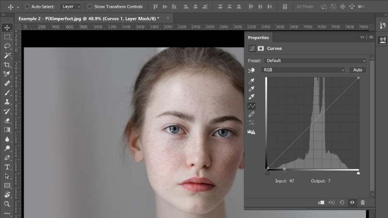 Headshot open in Photoshop with Curves adjustment for color grading and final tone refinement